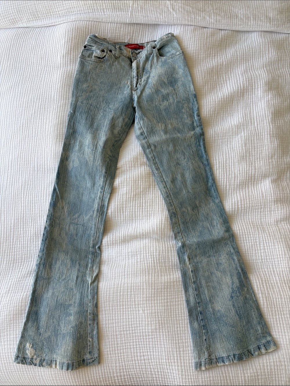 High-Rise Light Blue Flare Jeans with Vintage Wash